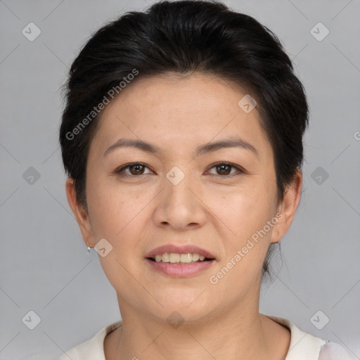 Joyful white adult female with short  brown hair and brown eyes