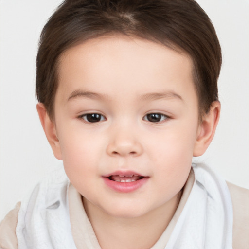 Joyful white child female with short  brown hair and brown eyes