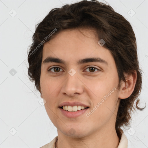 Joyful white young-adult male with medium  brown hair and brown eyes