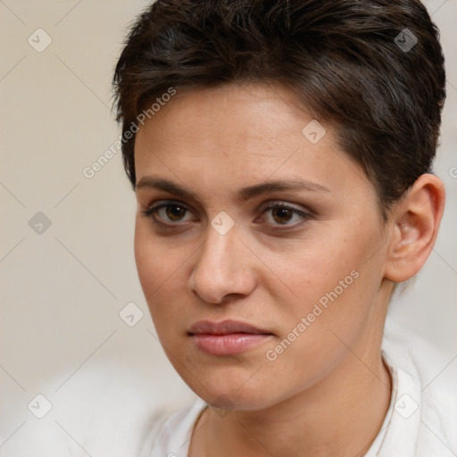 Joyful white young-adult female with short  brown hair and brown eyes