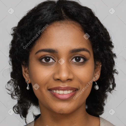 Joyful black young-adult female with medium  black hair and brown eyes