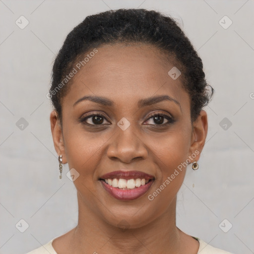 Joyful black young-adult female with short  brown hair and brown eyes