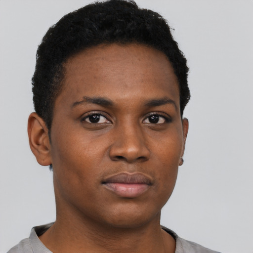 Neutral black young-adult female with short  black hair and brown eyes