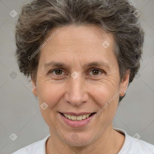 Joyful white adult female with short  brown hair and brown eyes