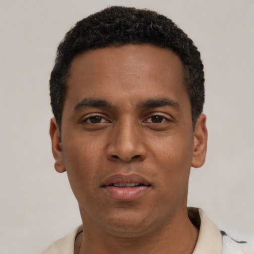 Neutral black young-adult male with short  black hair and brown eyes