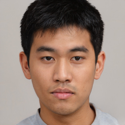 Neutral asian young-adult male with short  black hair and brown eyes