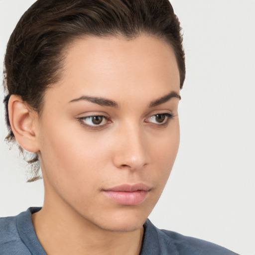 Neutral white young-adult female with short  brown hair and brown eyes