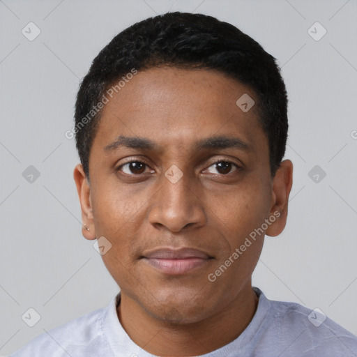 Joyful latino young-adult male with short  black hair and brown eyes