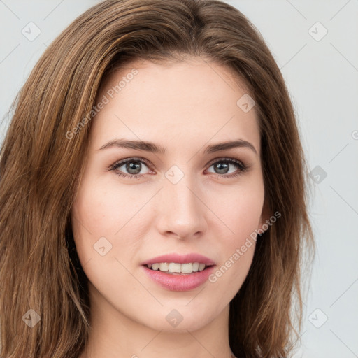 Joyful white young-adult female with long  brown hair and green eyes