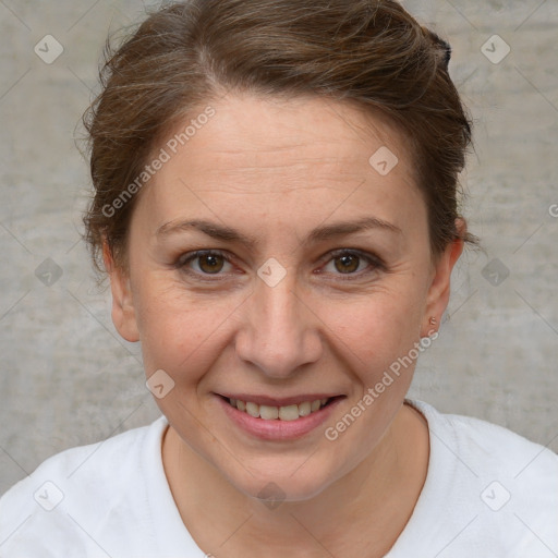 Joyful white adult female with short  brown hair and brown eyes