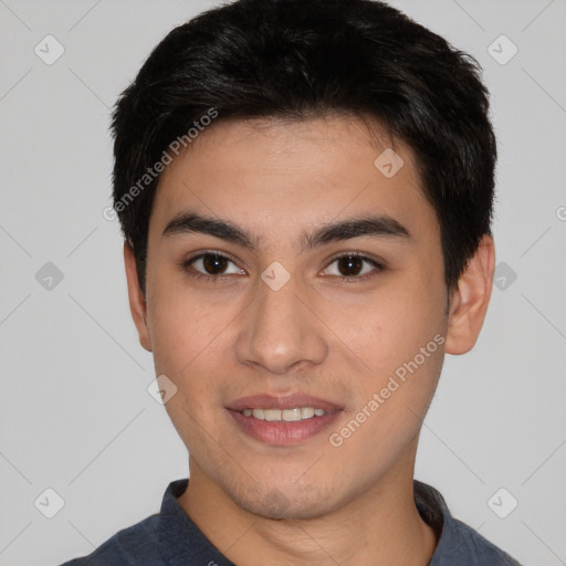 Joyful asian young-adult male with short  black hair and brown eyes