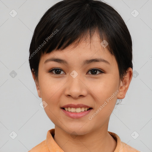 Joyful asian young-adult female with short  brown hair and brown eyes