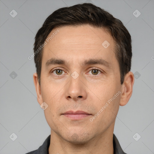 Neutral white adult male with short  brown hair and brown eyes