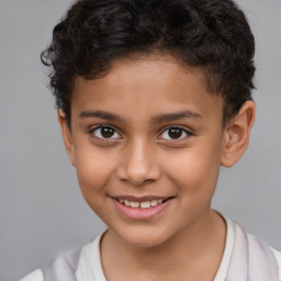 Joyful white child female with short  brown hair and brown eyes