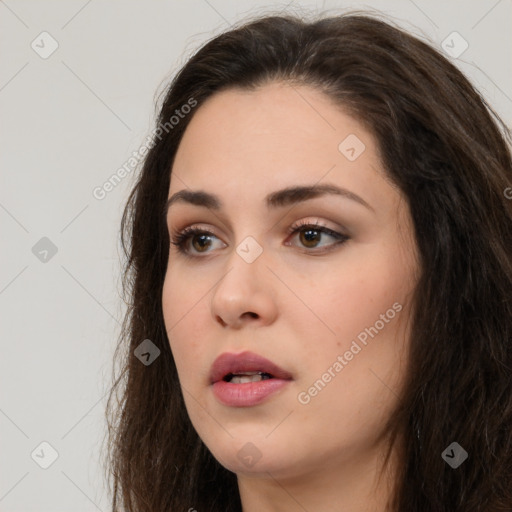 Neutral white young-adult female with long  brown hair and brown eyes