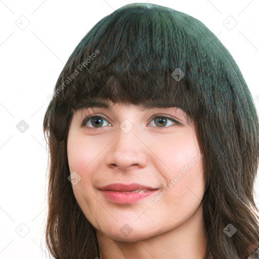 Joyful white young-adult female with long  brown hair and green eyes