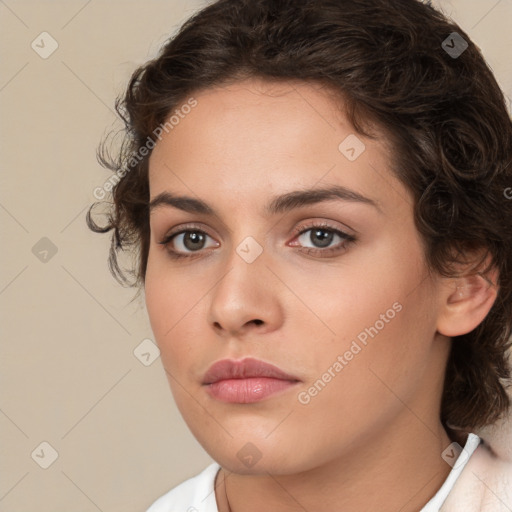 Neutral white young-adult female with medium  brown hair and brown eyes