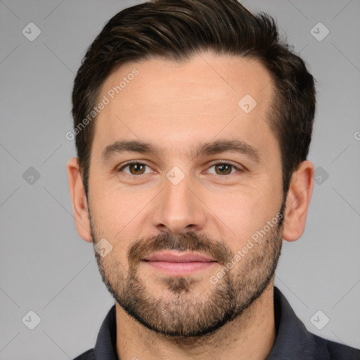 Joyful white adult male with short  brown hair and brown eyes