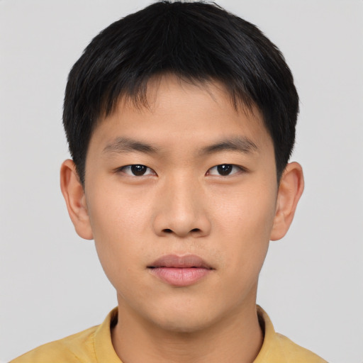 Neutral asian young-adult male with short  brown hair and brown eyes