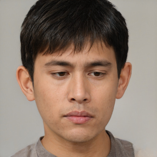 Neutral asian young-adult male with short  brown hair and brown eyes