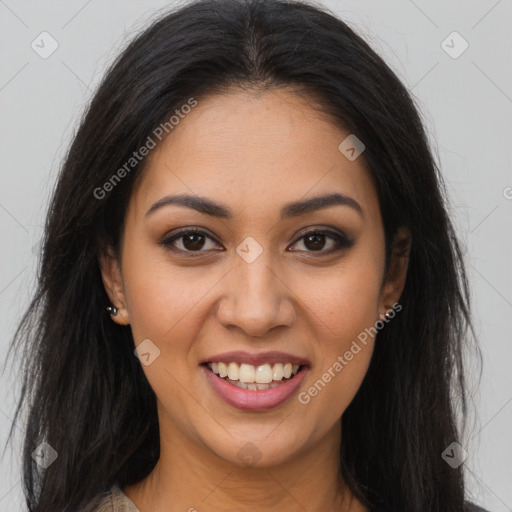 Joyful latino young-adult female with long  brown hair and brown eyes