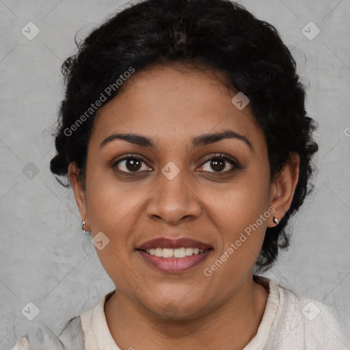 Joyful latino young-adult female with short  brown hair and brown eyes