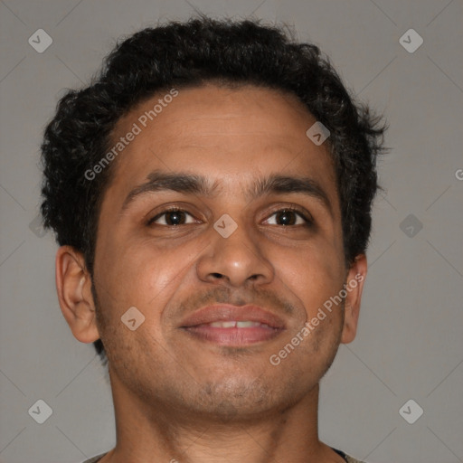Joyful latino adult male with short  brown hair and brown eyes
