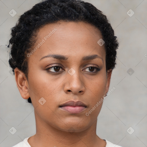 Neutral black young-adult female with short  brown hair and brown eyes