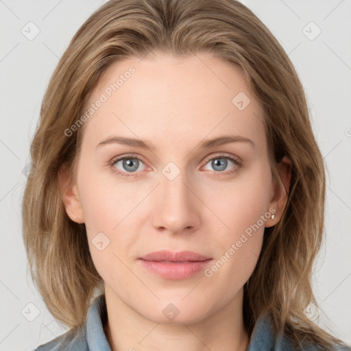 Joyful white young-adult female with medium  brown hair and blue eyes