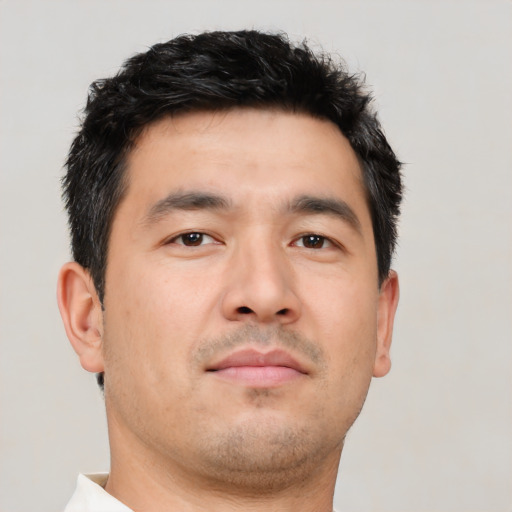 Neutral asian young-adult male with short  brown hair and brown eyes