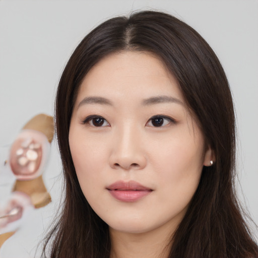 Neutral asian young-adult female with long  brown hair and brown eyes