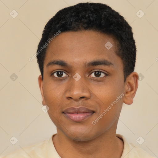 Joyful black young-adult male with short  brown hair and brown eyes