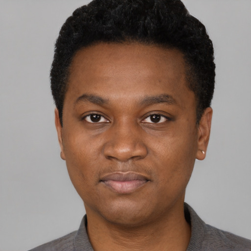 Neutral black young-adult male with short  black hair and brown eyes