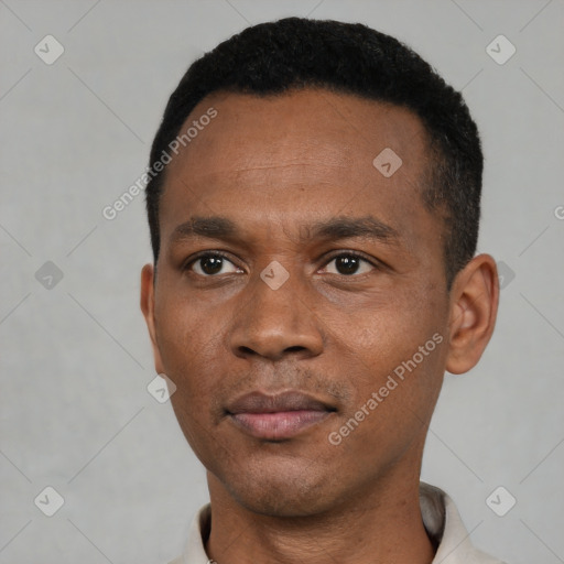 Neutral black adult male with short  black hair and brown eyes