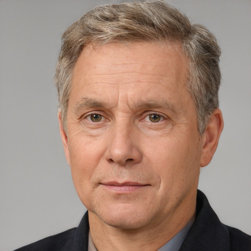 Neutral white middle-aged male with short  gray hair and brown eyes