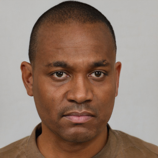 Neutral black young-adult male with short  brown hair and brown eyes