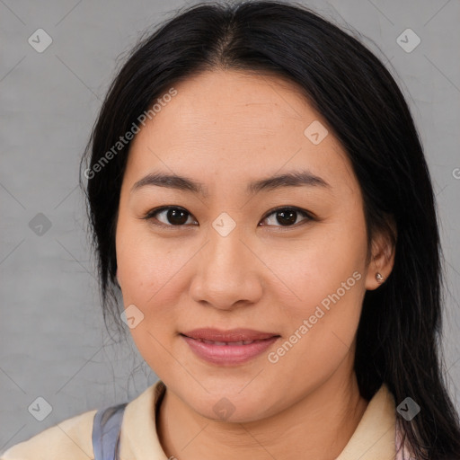 Joyful asian young-adult female with medium  brown hair and brown eyes