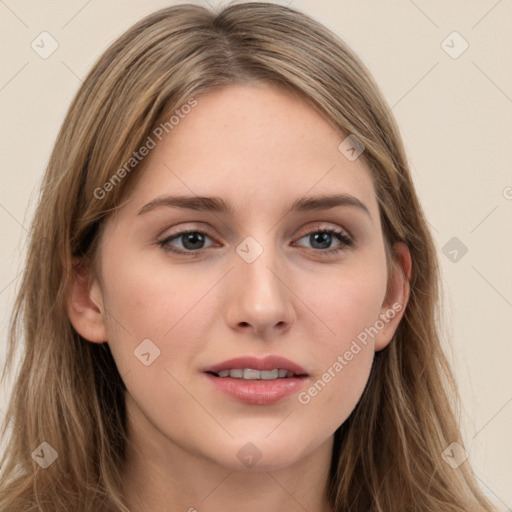 Joyful white young-adult female with long  brown hair and grey eyes