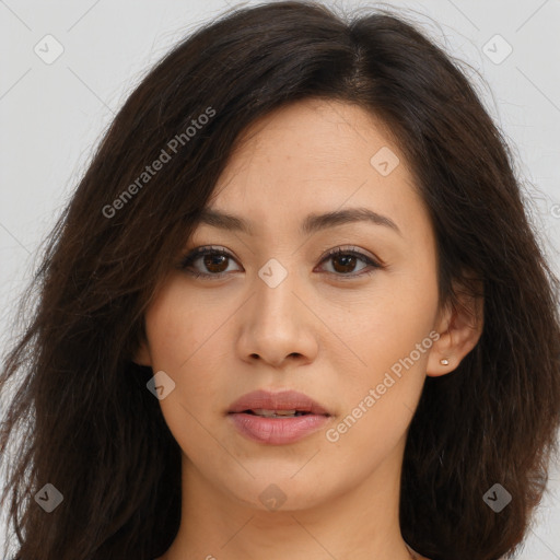 Joyful asian young-adult female with long  brown hair and brown eyes