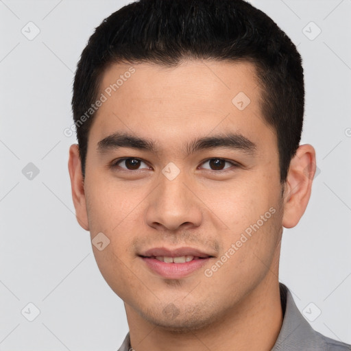 Joyful latino young-adult male with short  brown hair and brown eyes