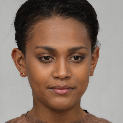 Neutral black young-adult female with short  brown hair and brown eyes