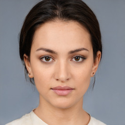 Neutral white young-adult female with medium  brown hair and brown eyes