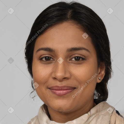 Joyful latino young-adult female with medium  brown hair and brown eyes