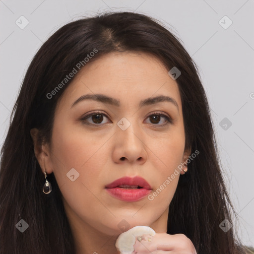 Joyful asian young-adult female with long  brown hair and brown eyes