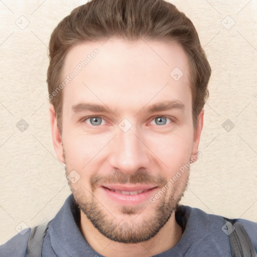 Joyful white young-adult male with short  brown hair and blue eyes