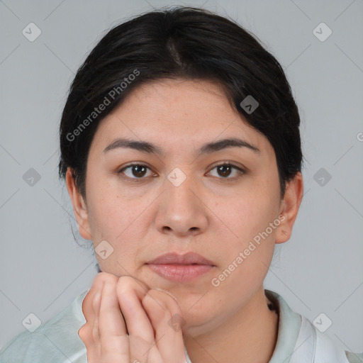 Neutral white young-adult female with short  black hair and brown eyes