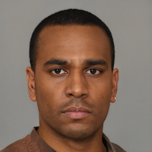 Neutral black young-adult male with short  brown hair and brown eyes