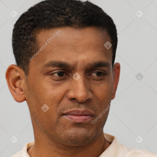 Neutral latino young-adult male with short  brown hair and brown eyes