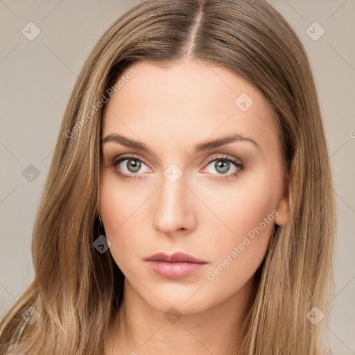 Neutral white young-adult female with long  brown hair and brown eyes