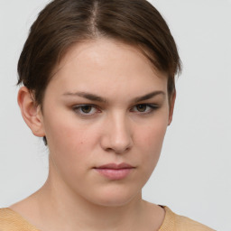 Neutral white young-adult female with short  brown hair and brown eyes